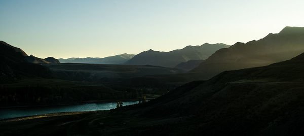 Scenic view of mountains against sky during sunset