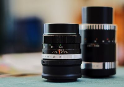 Close-up of lenses on table