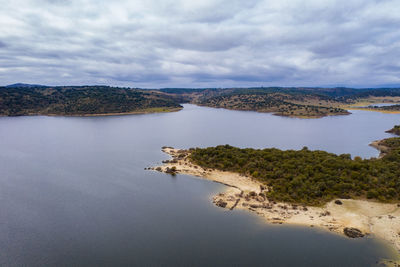 Drone aerial view of idanha dam marechal carmona landscape with beautiful lake water, in portugal