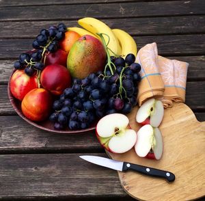 Close-up of fresh fruits on wooden table