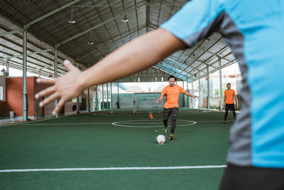 Player playing soccer on field