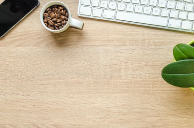 High angle view of coffee cup on table