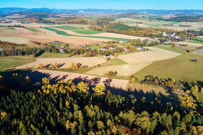 Mountain village and agricultural fields, aerial view. nature landscape