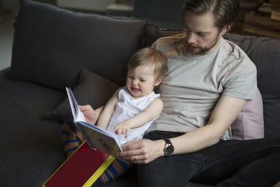 Father reading with son