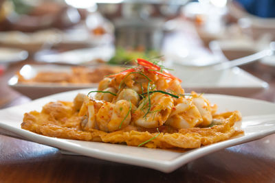 Close-up of burger in plate on table