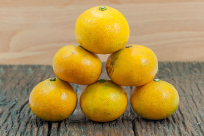 Close-up of oranges on table