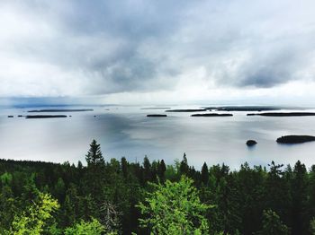 Scenic view of sea against cloudy sky