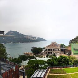 View of built structure by the sea