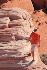 Man standing on rock formation