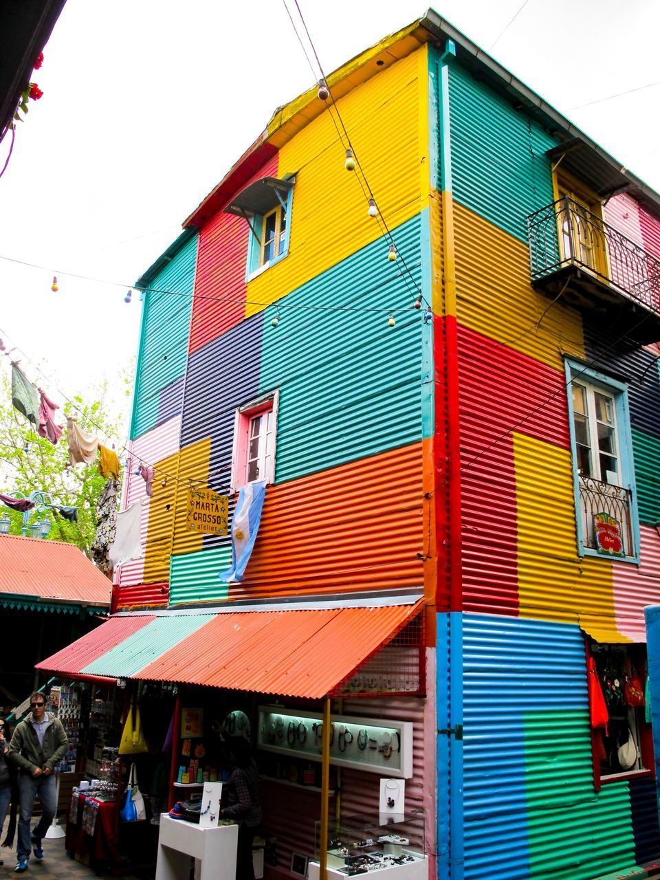 LOW ANGLE VIEW OF MULTI COLORED BUILDINGS IN HOUSE