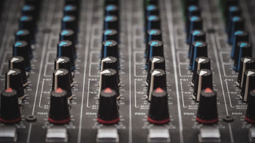 Full frame shot of sound mixer at recording studio