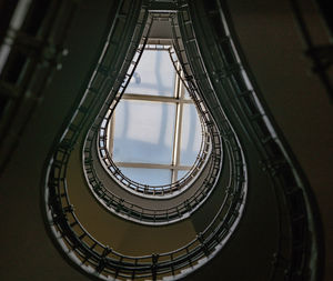 Low angle view of spiral staircase in building