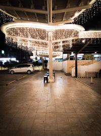 Illuminated parking lot in city at night