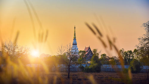 View of temple against sky during sunset