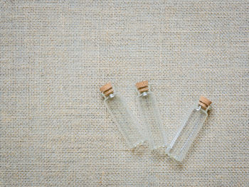 High angle view of glass tube on canvas
