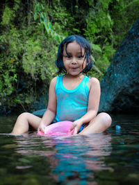 Portrait of a girl in water