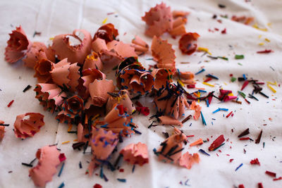 Close-up of pencil shavings on fabric