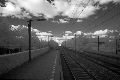 Railroad station platform against sky