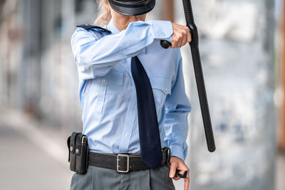 Rear view of woman standing outdoors