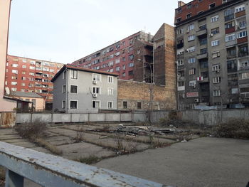 Buildings in city against sky