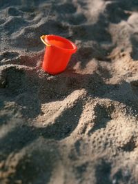 Close-up of red sand on beach