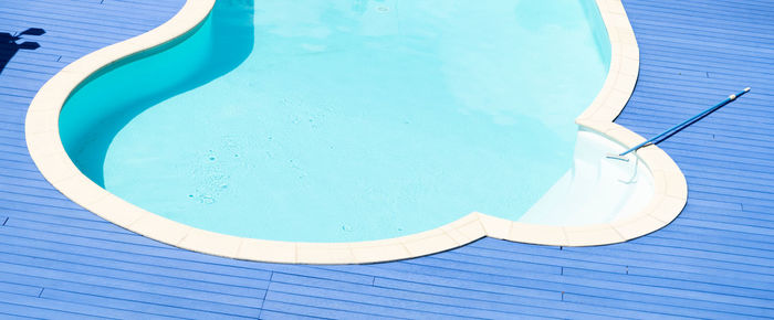 High angle view of swimming pool during sunny day