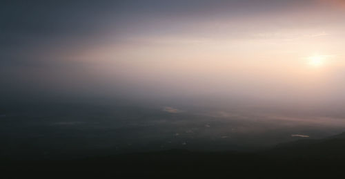 Scenic view of mountains against sky during sunset