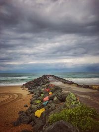 Scenic view of beach against sky