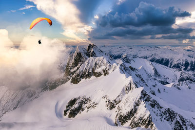 Scenic view of snowcapped mountain against sky