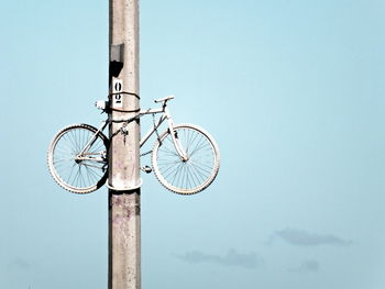 Low angle view of pole against sky