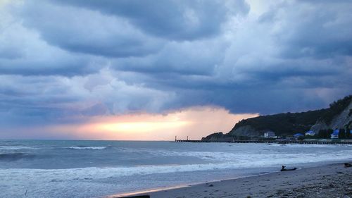 Scenic view of sea against cloudy sky