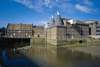 The three mills tidal mill complex spans bow creek seen here at low tide