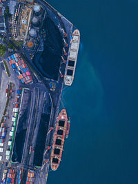 High angle view of illuminated buildings in city at night