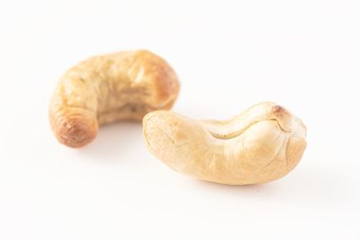 Close-up of bread against white background