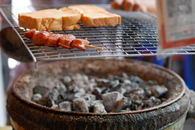 Close-up of meat on barbecue grill