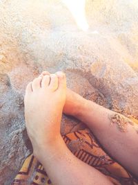 Low section of woman on beach