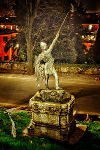 Statue of illuminated at night