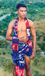 Young man standing on land