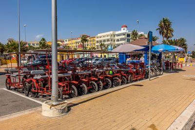 Panoramic shot of people on beach against clear sky