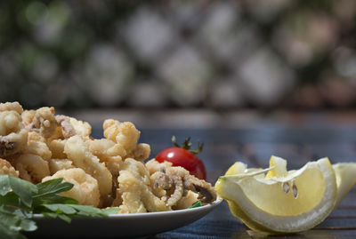 Close-up of fruits in bowl on table