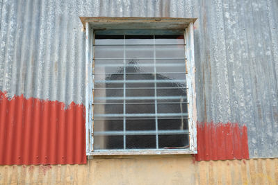 Low angle view of window of building