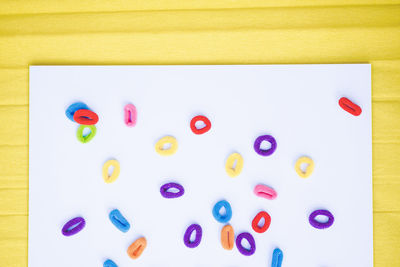 High angle view of colorful papers