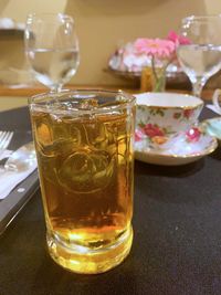 Close-up of beer in glass on table