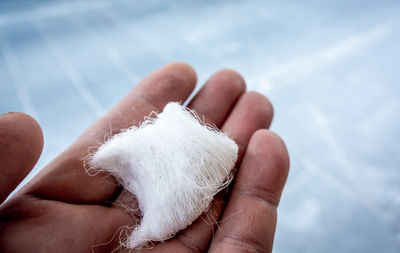 Cropped hand of woman