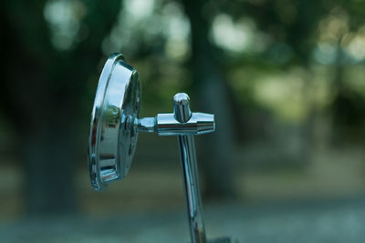 Close-up of bicycle on field