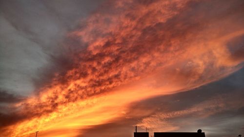 Scenic view of orange sky