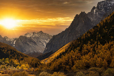 Scenic view of mountains against sky during sunset