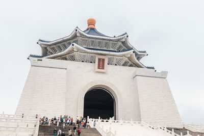 Group of people in front of building