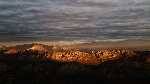 View of landscape against cloudy sky