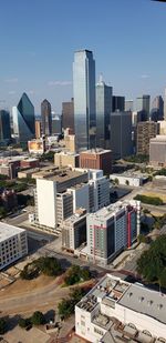 High angle view of buildings in city against sky